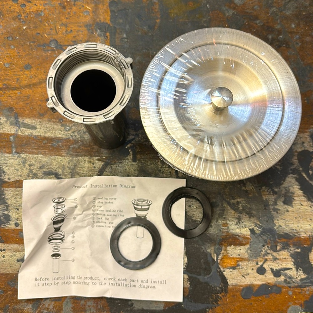 5/$15! Stainless steel sink strainer with parts for installation.